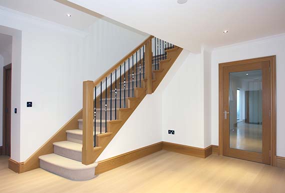 Elegant staircase crafted by JOS Construction's skilled joiners