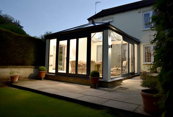 Elegant sunroom with a view of the garden