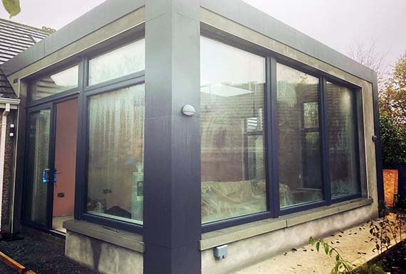 Exterior view of a finished conservatory by JOS Construction